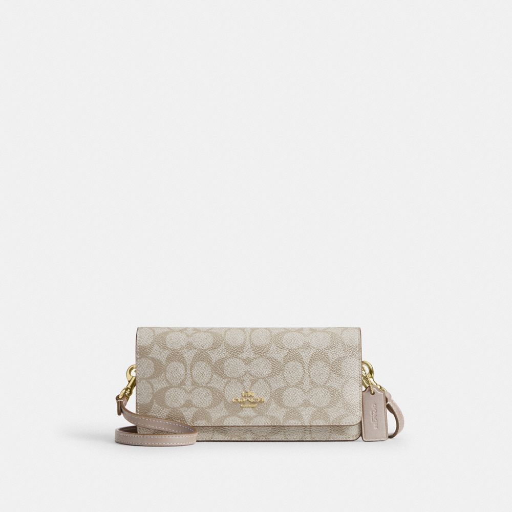 COACH®,Evie Crossbody Bag in Signature Canvas,,Front View