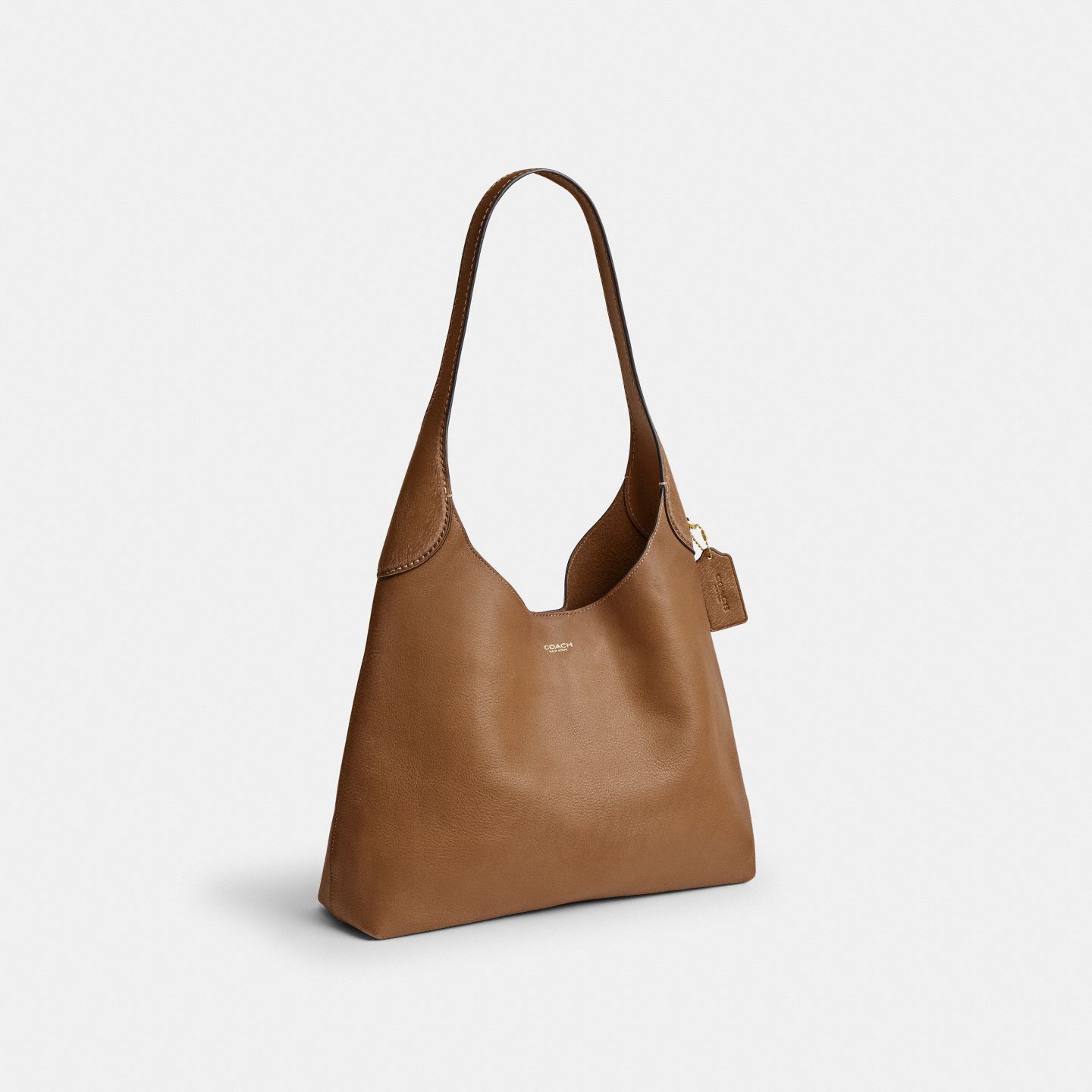 Женская сумка Coach Brooklyn Shoulder Bag 34 In Loved Leather, цвет: Латунный / Медовый коричневый — фото 2