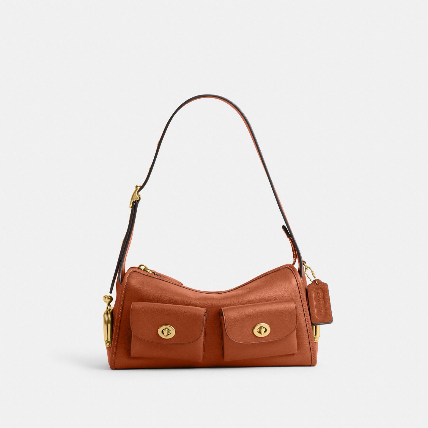 Женская сумка Coach Turnlock Haversack Bag 27, цвет: Латунный / Янтарный коричневый — фото 1