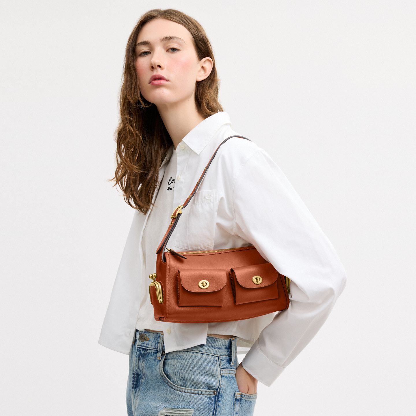 Женская сумка Coach Turnlock Haversack Bag 27, цвет: Латунный / Янтарный коричневый — фото 7