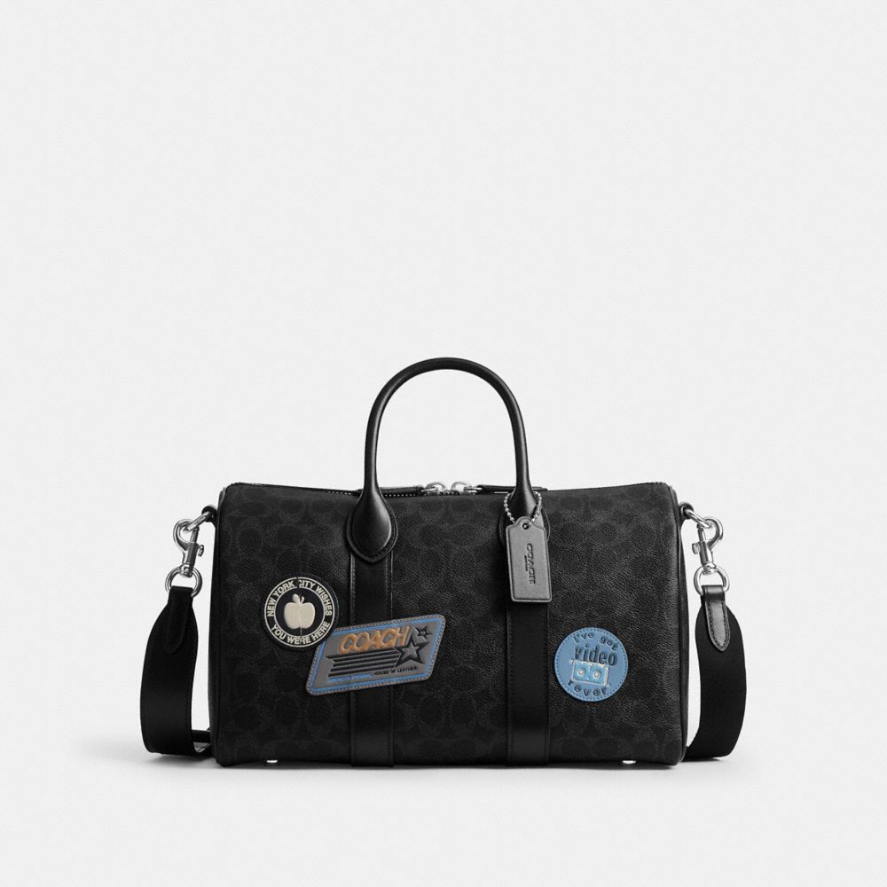 COACH®,Compass Bag 35 With Stickers In Signature UpcraftedLeather,,Front View