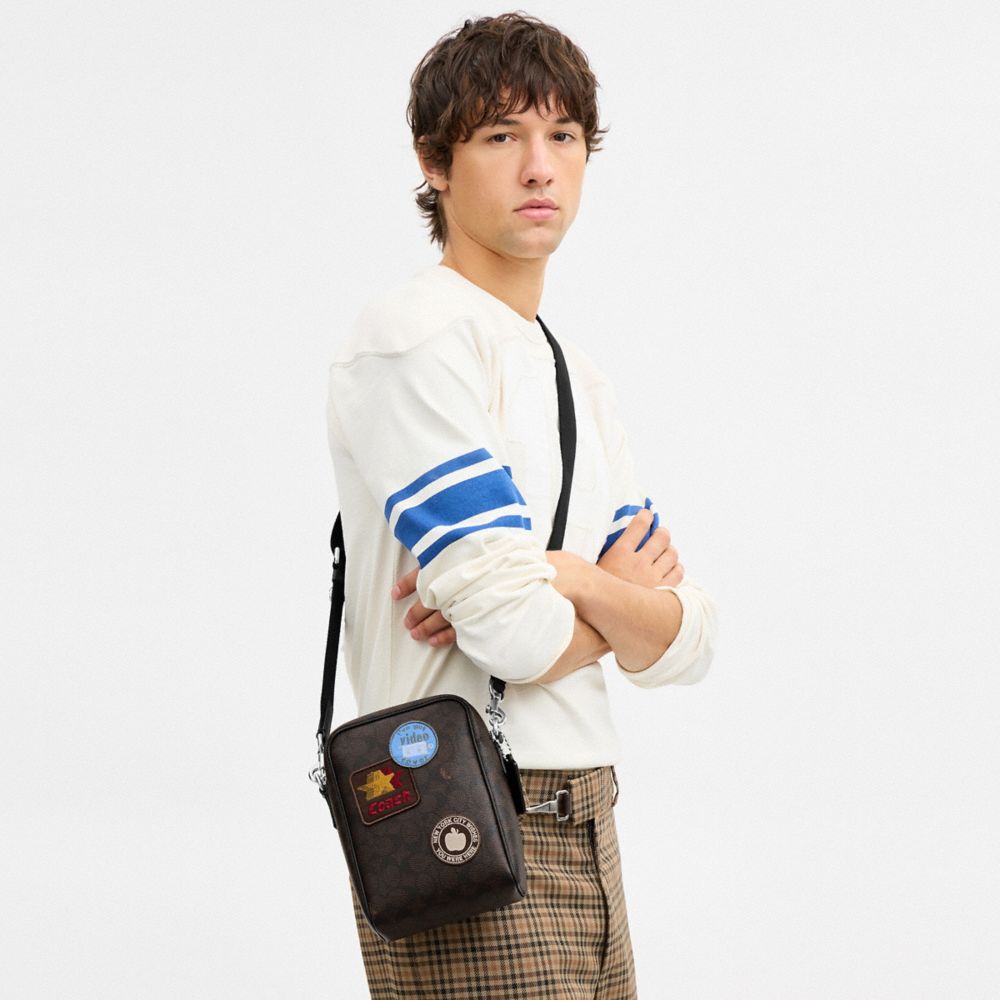 Tristan Crossbody Bag 14 In Signature Canvas With Patches