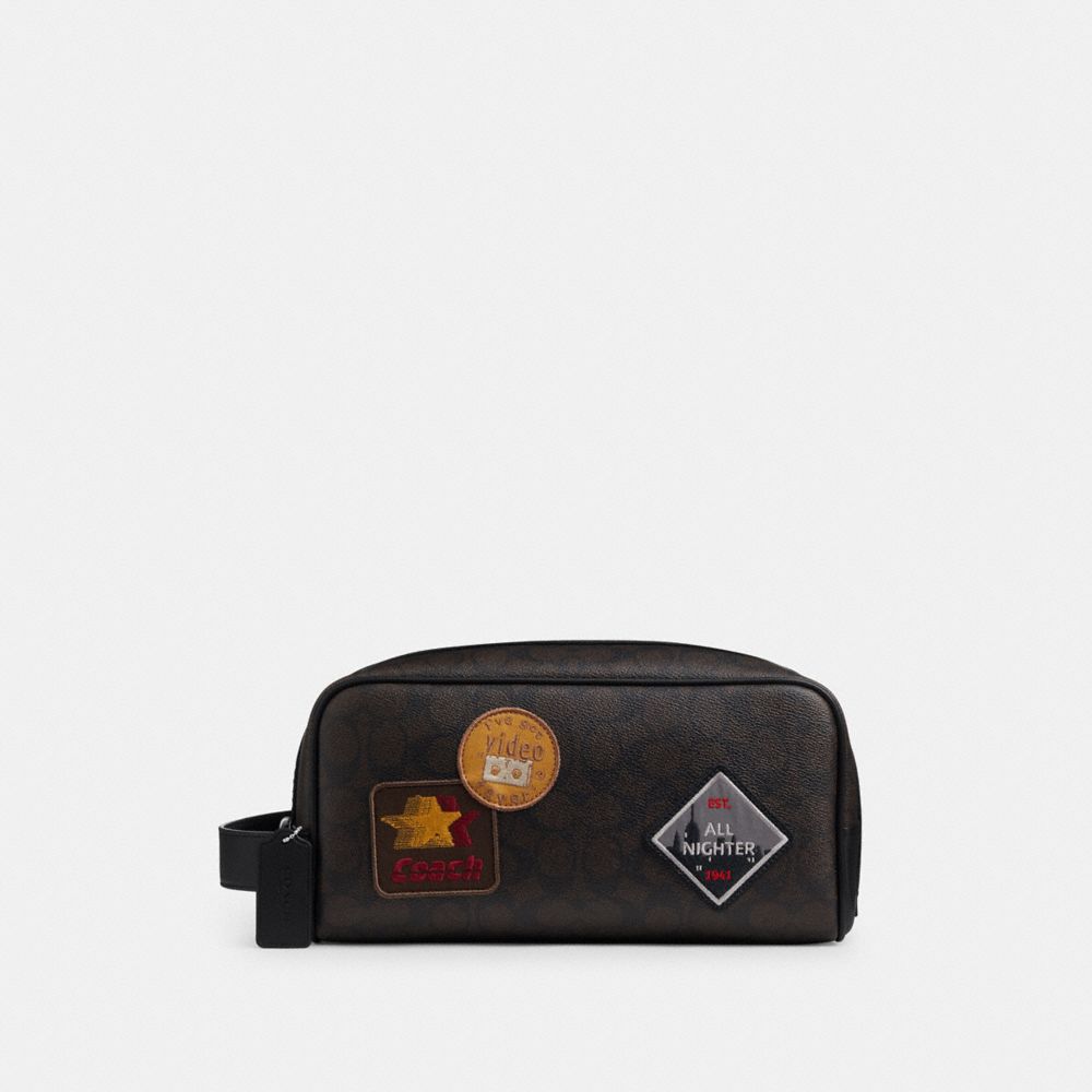 COACH®,Large Travel Kit In Signature Canvas With Patches,,Front View