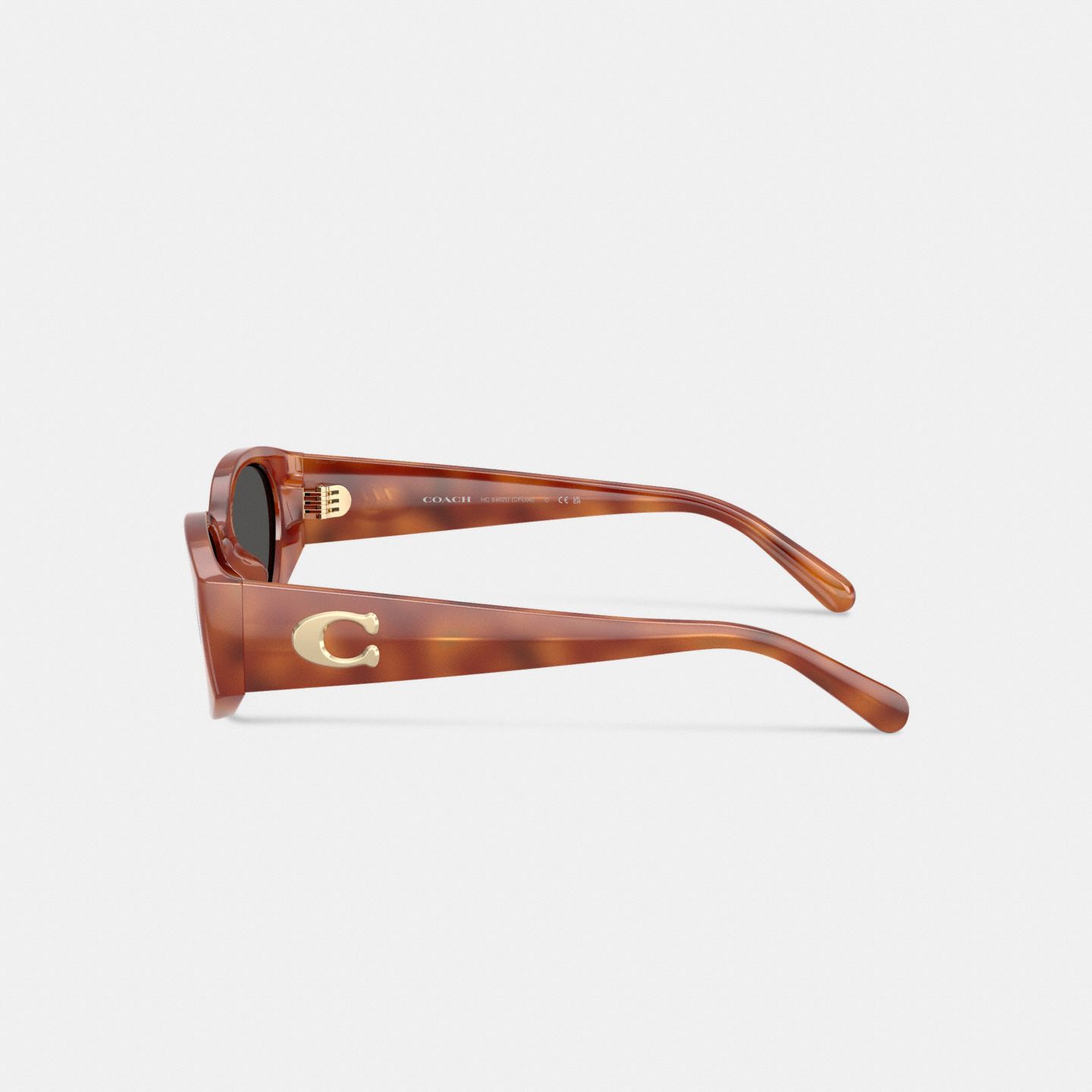 Женские солнцезащитные очки Coach Maxi Sculpted C Narrow Round Sunglasses, цвет: Карамельный черепаховый — фото 3