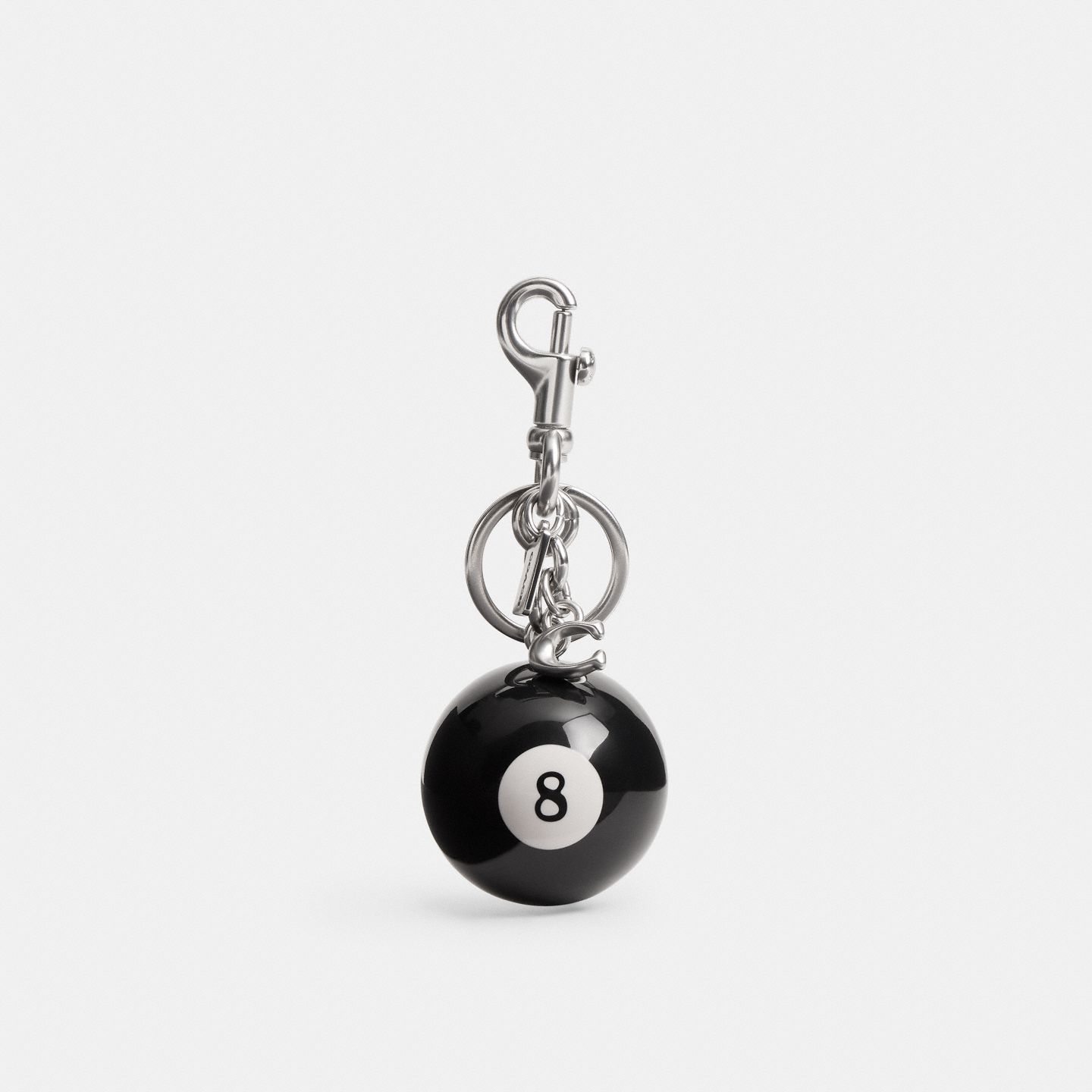 Женский брелок Coach Eight Ball Bag Charm, цвет: Чёрный / Разноцветный — фото 1