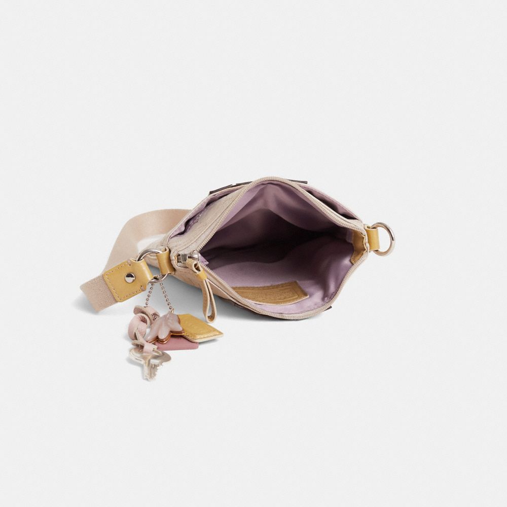 COACH®,Upcrafted Mia Embossed Op Art Swingpack,,Inside View,Top View