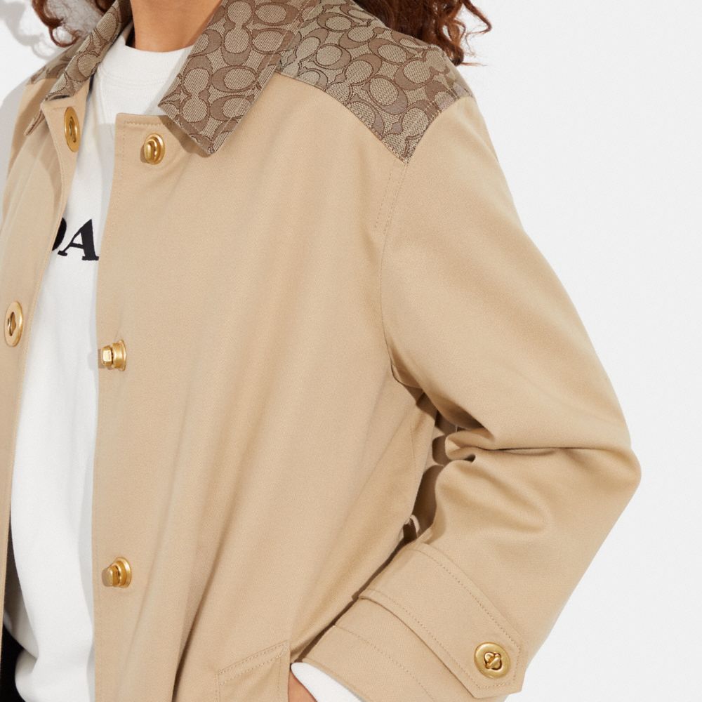 Coach raincoat with hot sale signature lining
