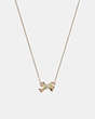 COACH®,PAVE BOW PENDANT NECKLACE,Brass,Gold/Multi,Front View