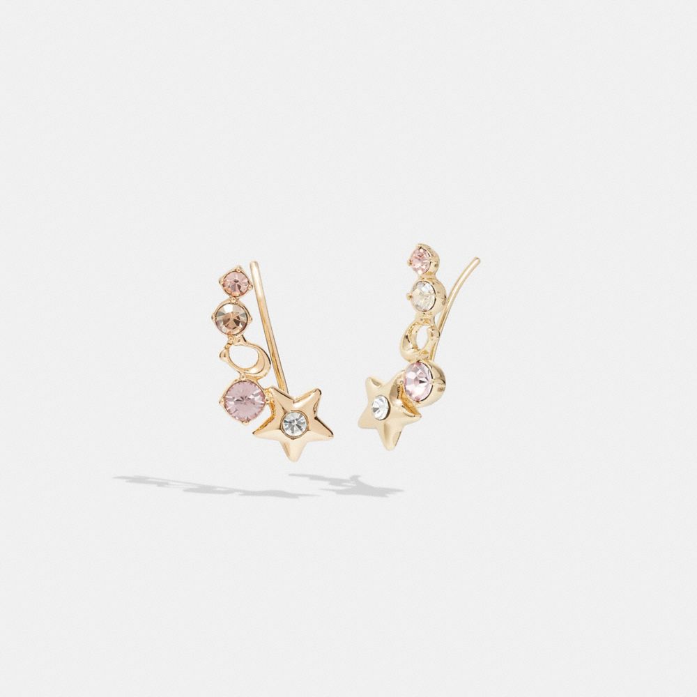 Boucles d’oreilles cloutées étoile rayonnante signature