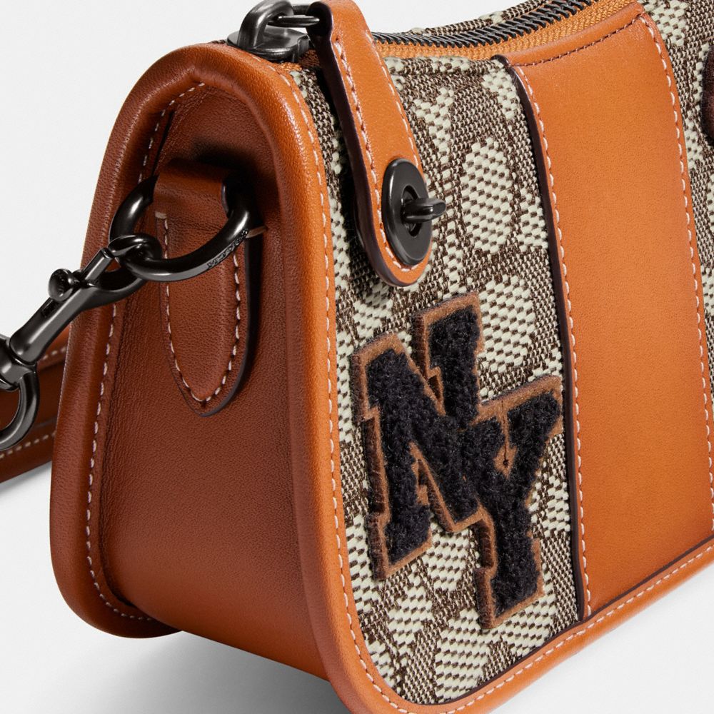 COACH®  Swinger 20 In Signature Jacquard With Varsity Patches