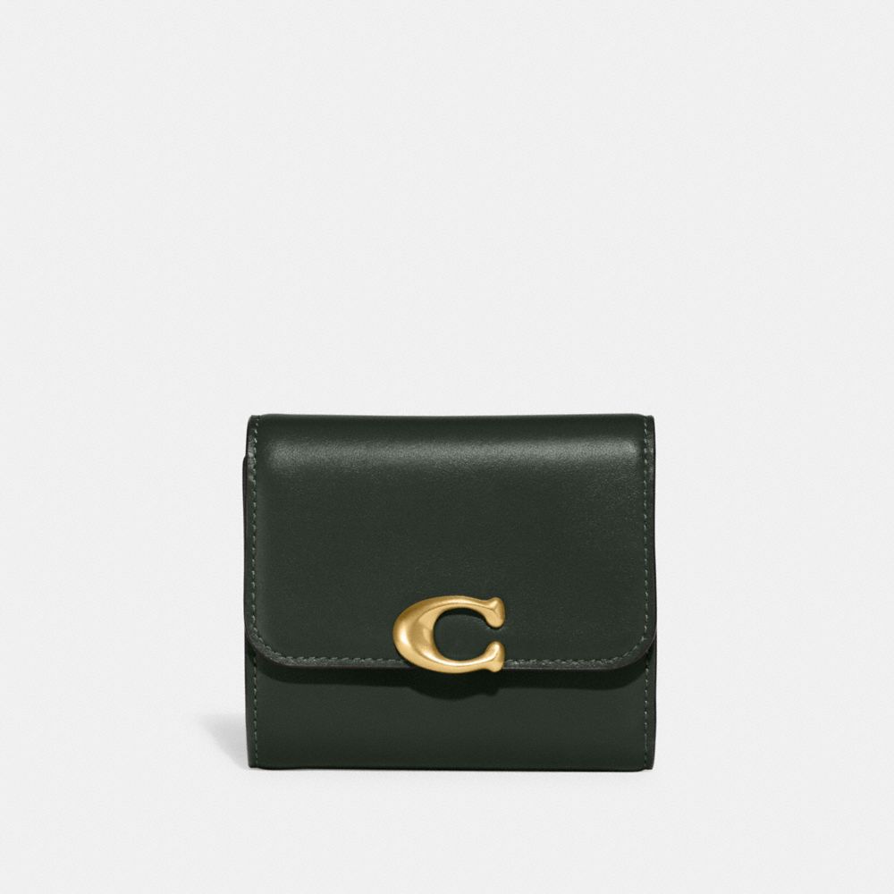 Coach wallet best sale with strap