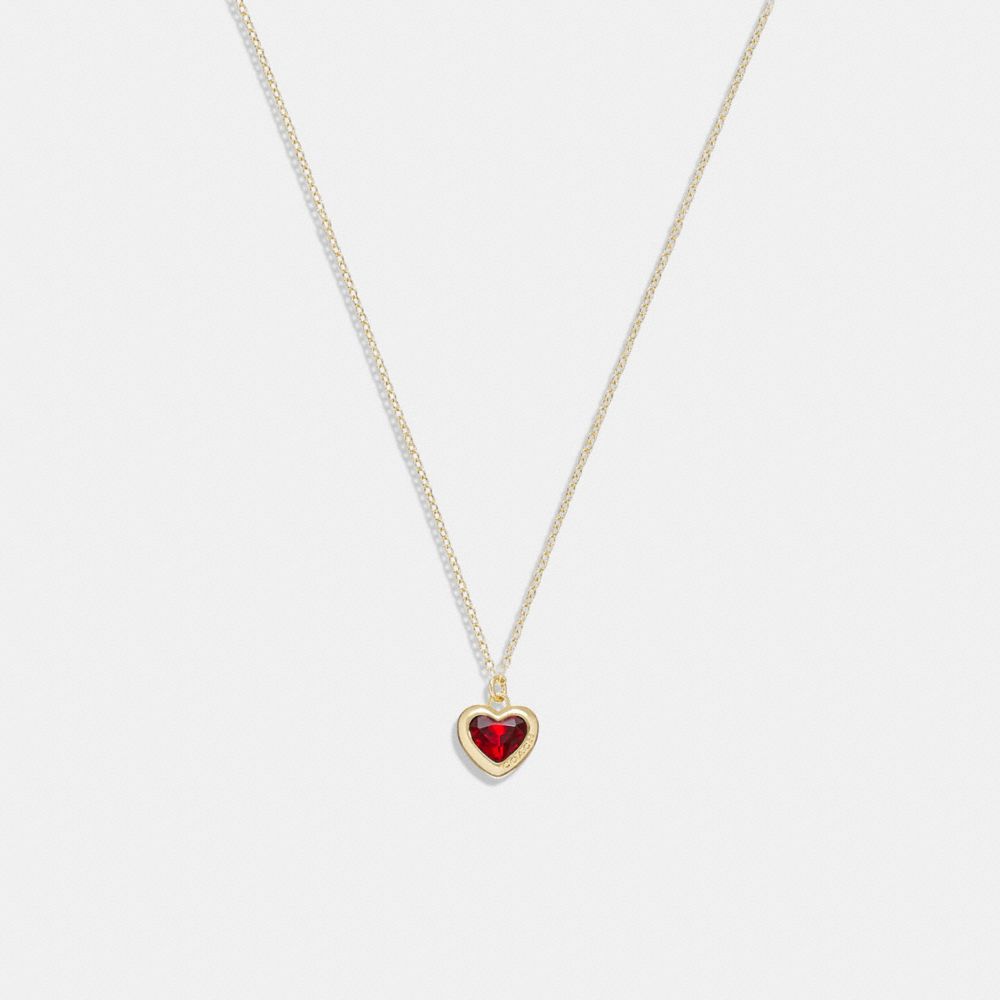 COACH®,Heart Pendant Necklace,Single Strand,Cubic Zirconia,Glass,Crystal,Gem Embellishment,Logo,Engraved Detail,Brass,Casual,,Front View