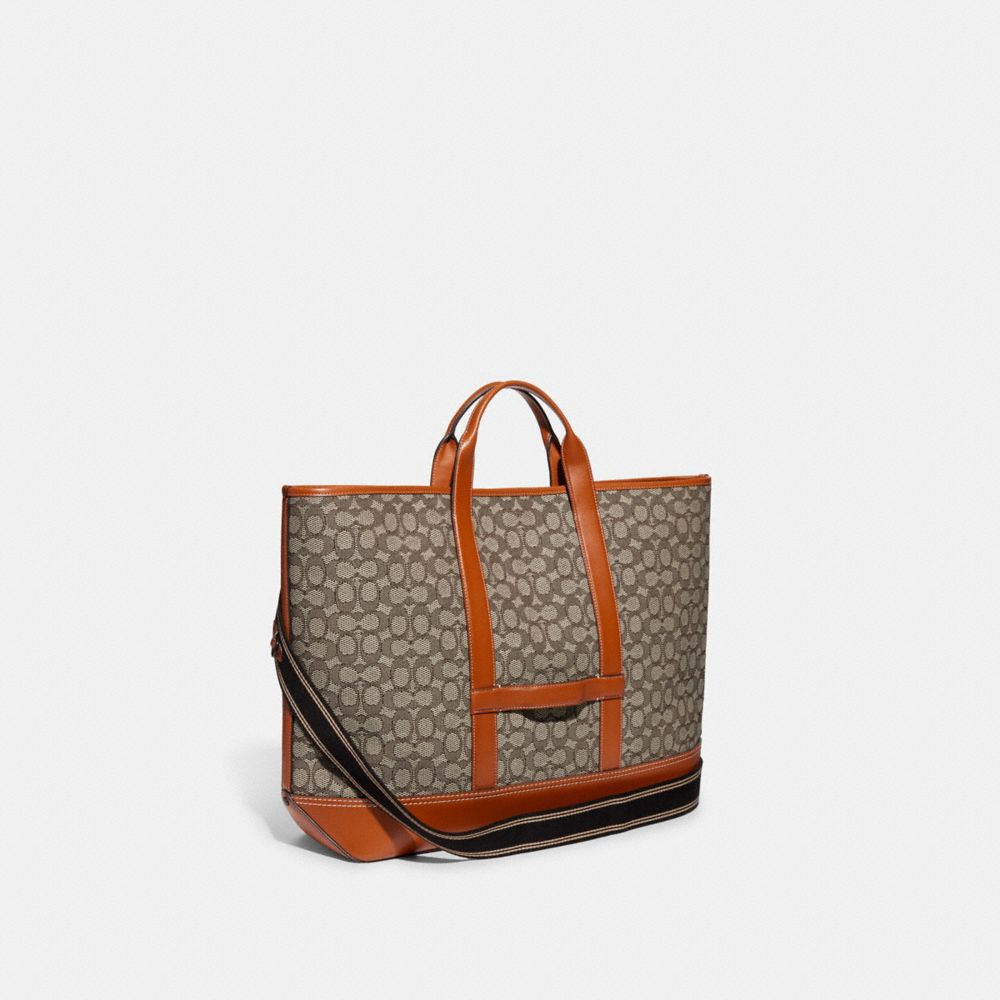 COACH® | Toby Turnlock Tote In Signature Textile Jacquard With