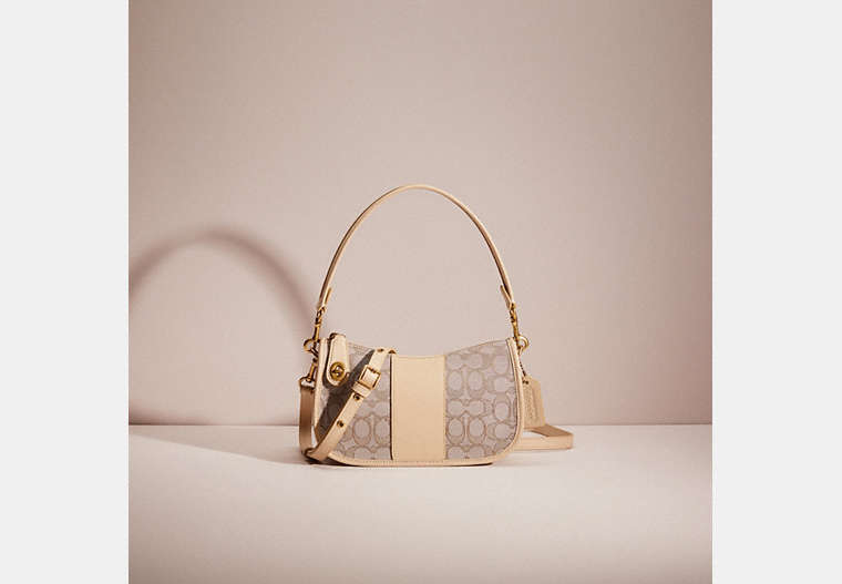 COACH®,RESTORED SWINGER BAG IN SIGNATURE JACQUARD,Brass/Stone Ivory,Front View