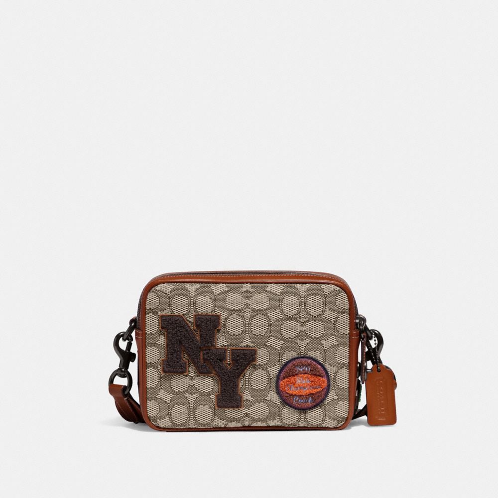 COACH®,FLIGHT BAG 19 IN SIGNATURE TEXTILE JACQUARD WITH VARSITY PATCHES,Signature Jacquard,Small,Cocoa Multi,Front View image number 0