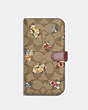 COACH®,IPHONE 14 PRO MAX FOLIO IN SIGNATURE CANVAS WITH WILFLOWER PRINT,pvc,Khaki Multi,Front View