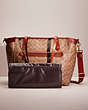 COACH®,RESTORED BABY BAG IN SIGNATURE CANVAS,Signature Coated Canvas,Brass/Tan/Rust,Angle View