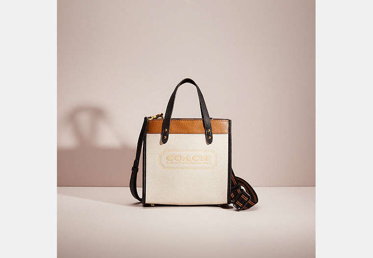 COACH®,RESTORED FIELD TOTE 22,Polished Pebble Leather,Medium,Brass/Chalk Multi,Front View