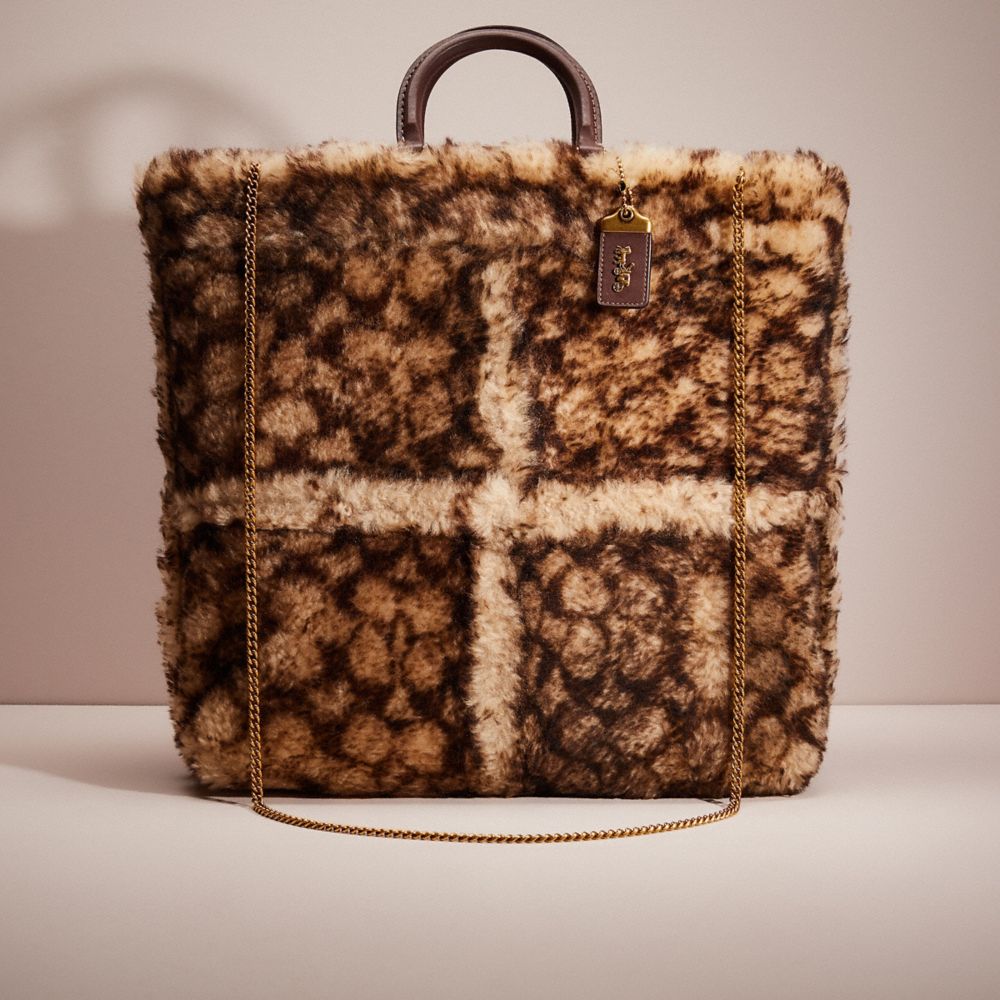 coach rogue tote in signature shearling