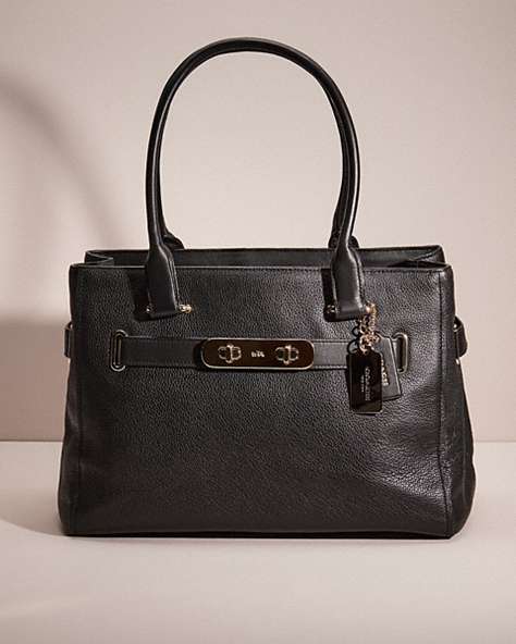 COACH®,RESTORED SWAGGER CARRYALL,Polished Pebble Leather,Light Gold/Black,Front View