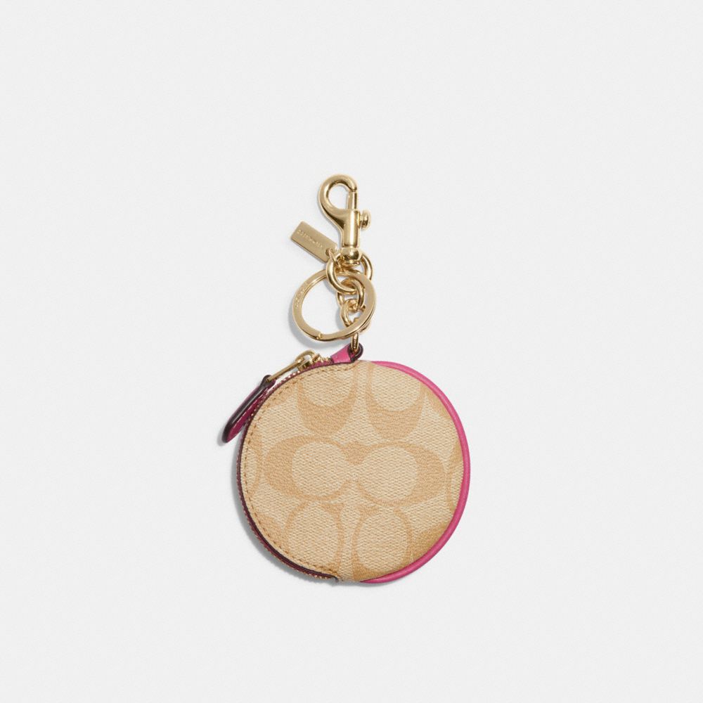 COACH®,CIRCULAR COIN POUCH BAG CHARM IN SIGNATURE CANVAS,Mini,Im/Light Khaki/Petunia,Front View