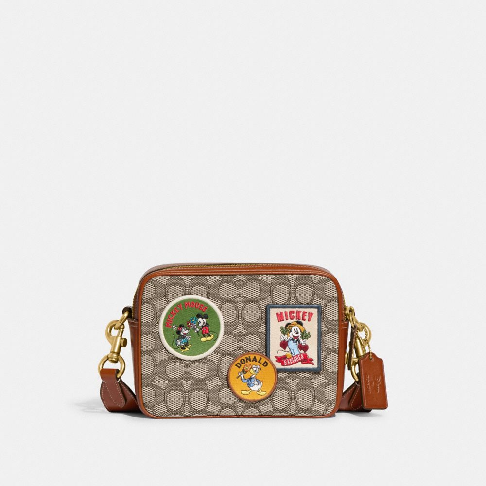 新品DISNEY X COACHフライト バッグ 19・リジェネラティブ レザー