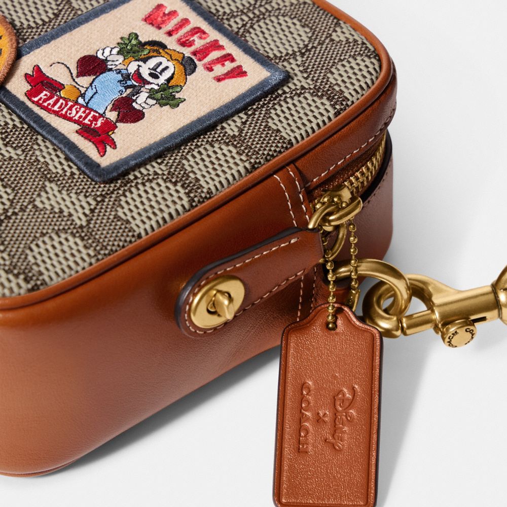 【DISNEY X COACH】フライト バッグ  - 【公式】COACH – コーチ