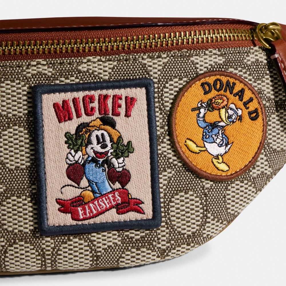 Disney x Coach's New Collection Just Dropped & It's Selling Out Fast