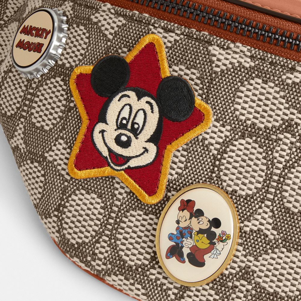 COACH×DISNEY CHARTER BELT BAG 7 IN SIGジップ開閉裏地付き