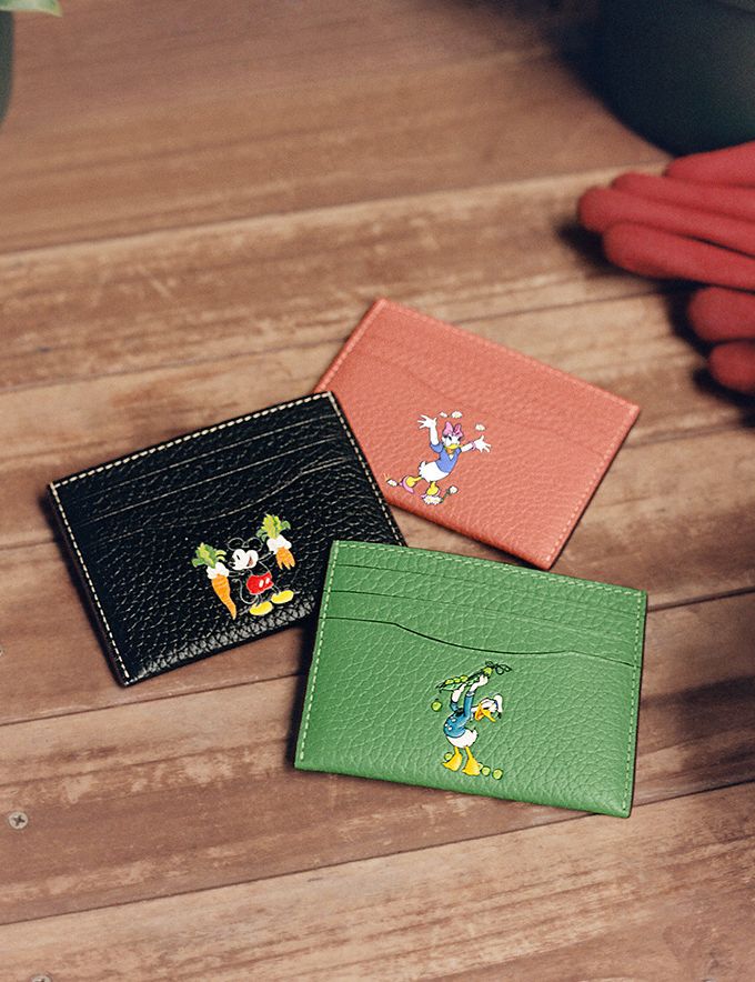 COACH®,Disney X Coach Card Case In Regenerative Leather,,Angle View