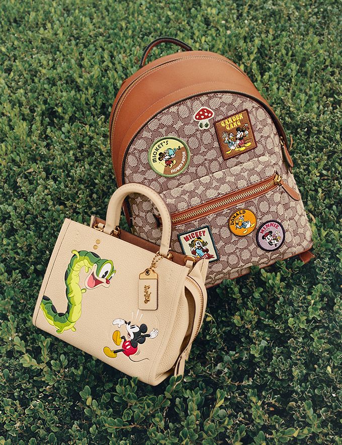 Disney X Coach Charter Backpack In Signature Textile Jacquard With Patches