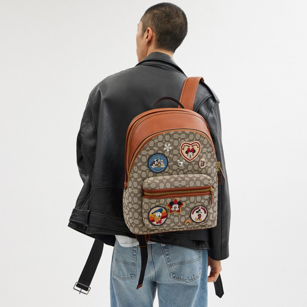 COACH® | Disney X Coach Charter Backpack In Signature Textile 