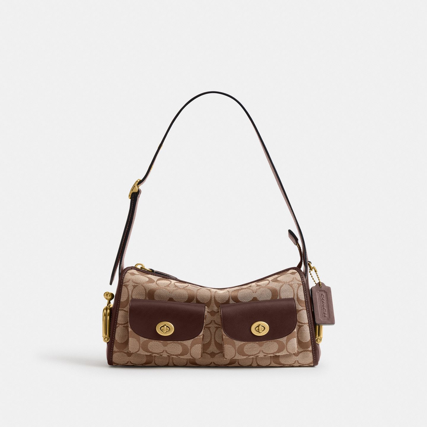 Женская сумка Coach Turnlock Haversack Bag 27 In Signature Jacquard, цвет: Хаки кленовый — фото 1