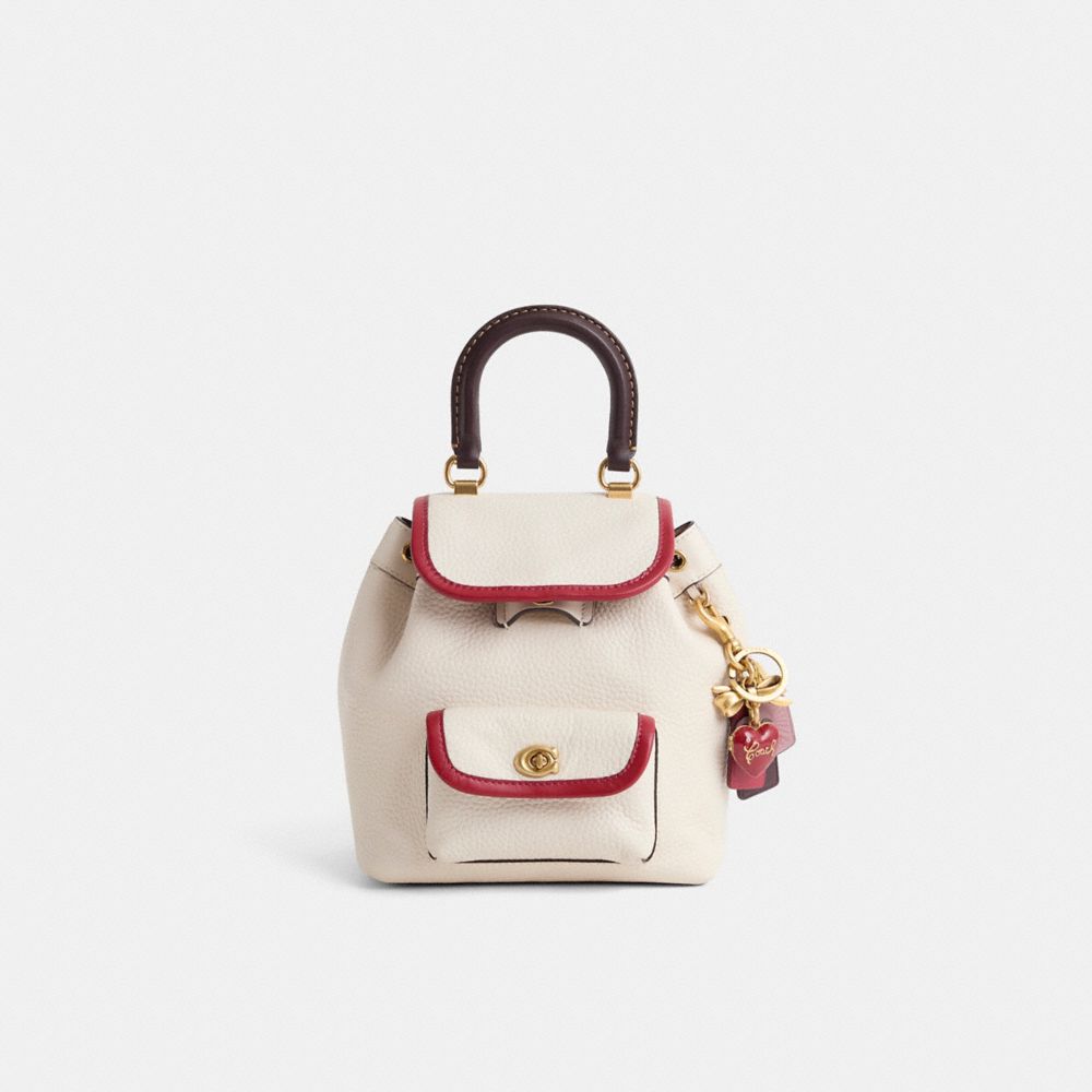 coach faye backpack in colorblock Court Signature Canvas This Pacer Backpack is a gently worn design restored to its original condition by the talented craftspeople at our Coach Repair Workshop HTF Coach Faye Convertible Crossbody/Backpack
