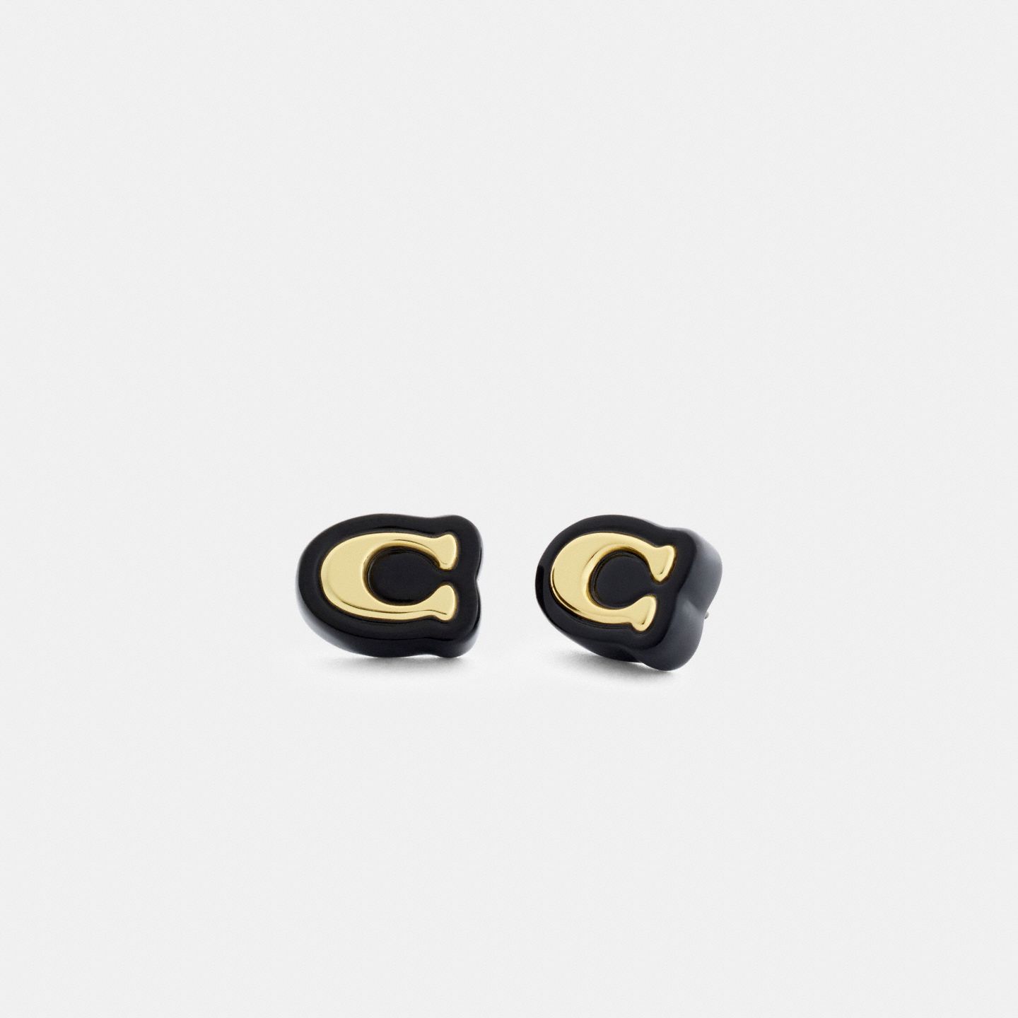 Серьги-гвоздики Coach Signature из смолы, цвет: Золотой / Чёрный — фото 1