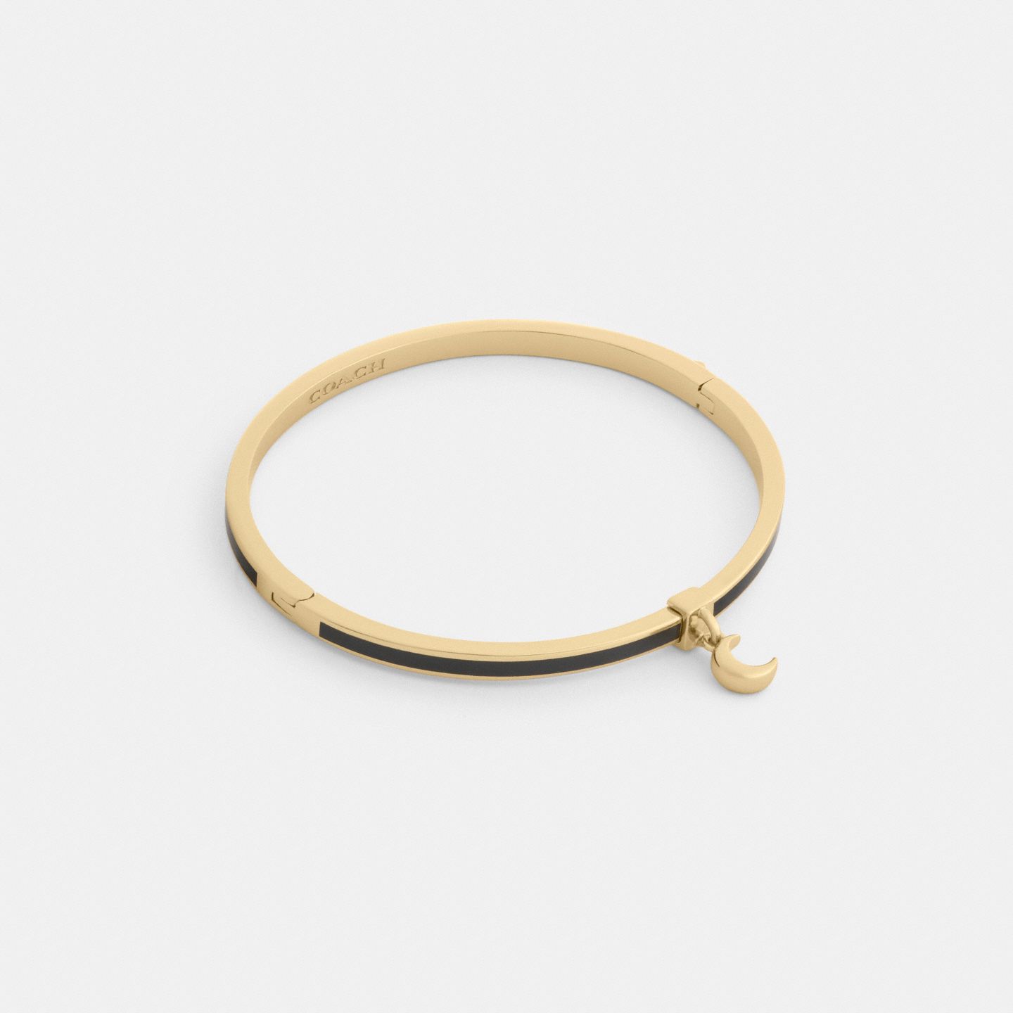 Женский браслет Coach Moon Charm Enamel Thin Hinged, цвет: Золотой / Чёрный — фото 1