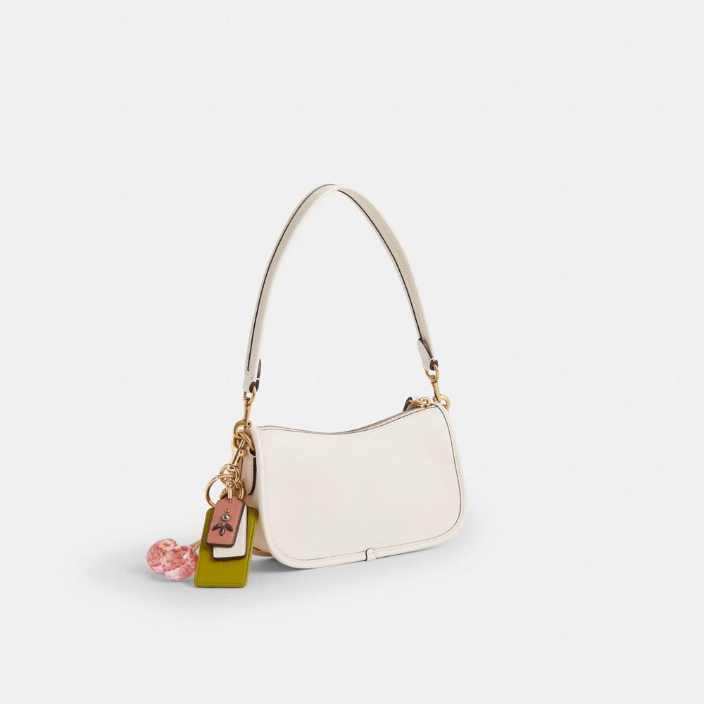 COACH®,Reloved Swinger Bag 20,Cream,Angle View