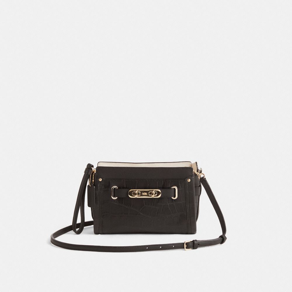 COACH®,Restored Coach Swagger Wristlet,,Front View