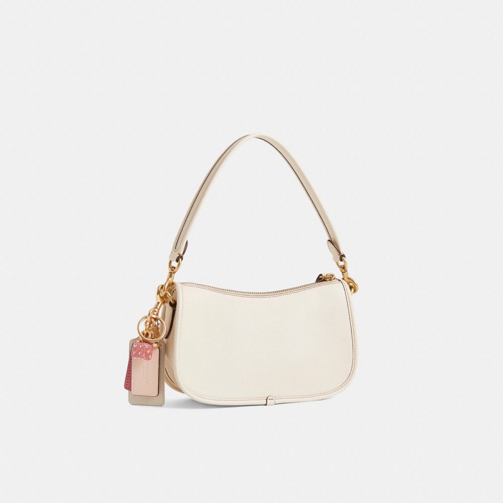 COACH®,Reloved Swinger Bag,,Angle View