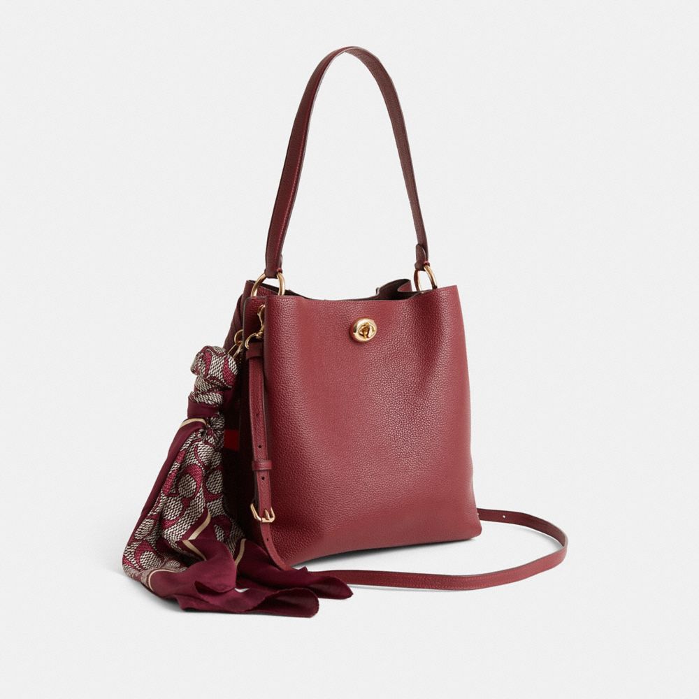 COACH®,Reloved Charlie Bucket Bag,,Angle View
