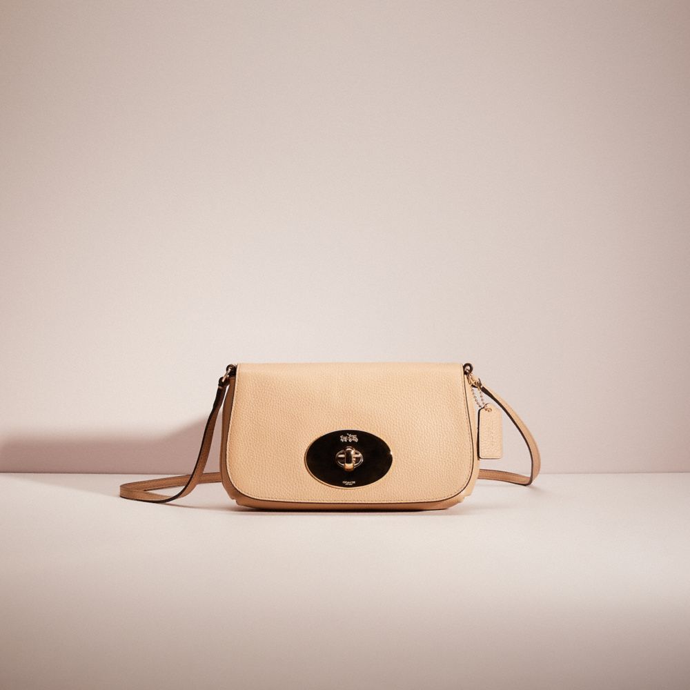 Coach liv crossbody 2025 in pebbled leather