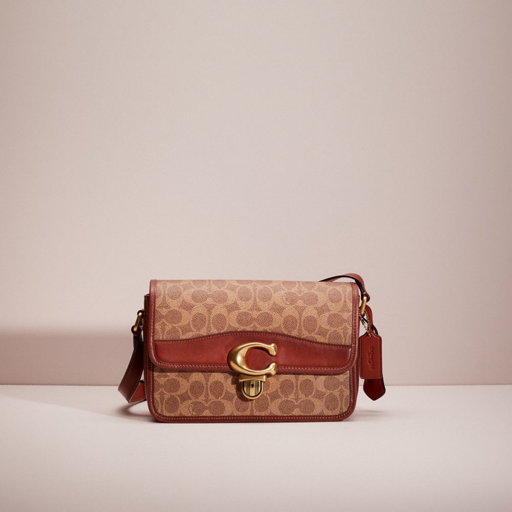 Coach camera bag online tan rust