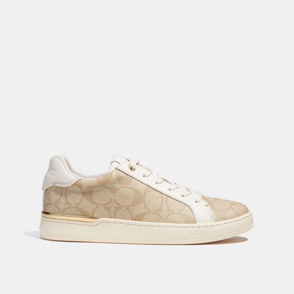 COACH®,CLIP LOW TOP SNEAKER IN SIGNATURE CANVAS,Light Khaki/ Chalk,Angle View