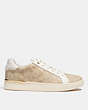 COACH®,CLIP LOW TOP SNEAKER IN SIGNATURE CANVAS,Signature Coated Canvas,Light Khaki/ Chalk,Angle View