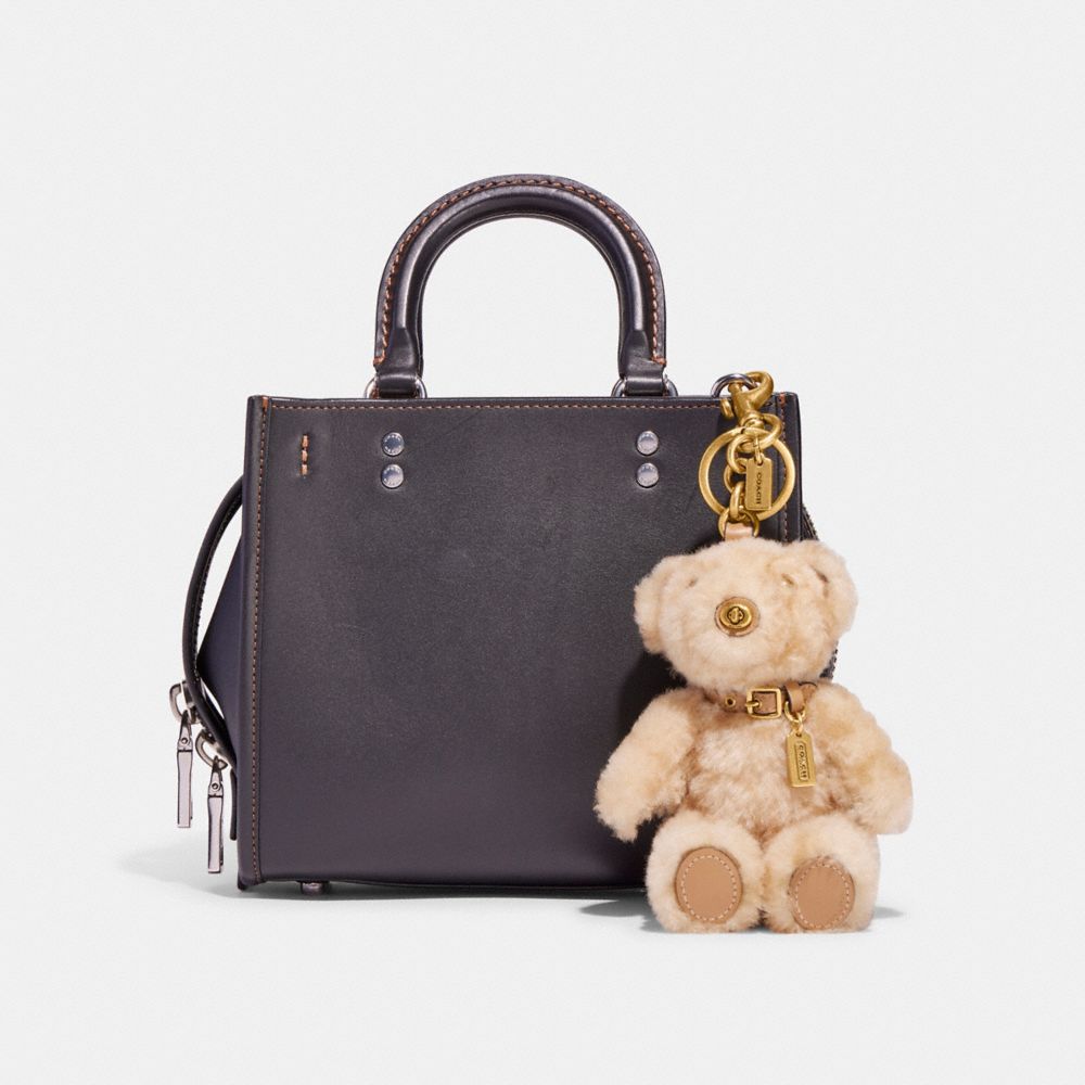 COACH®,BEAR BAG CHARM IN SIGNATURE SHEARLING,Leather,Mini,Brass/Beige,Angle View