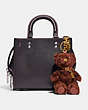 COACH®,BEAR BAG CHARM IN SIGNATURE SHEARLING,Leather,Brass/Chocolate Brown,Angle View