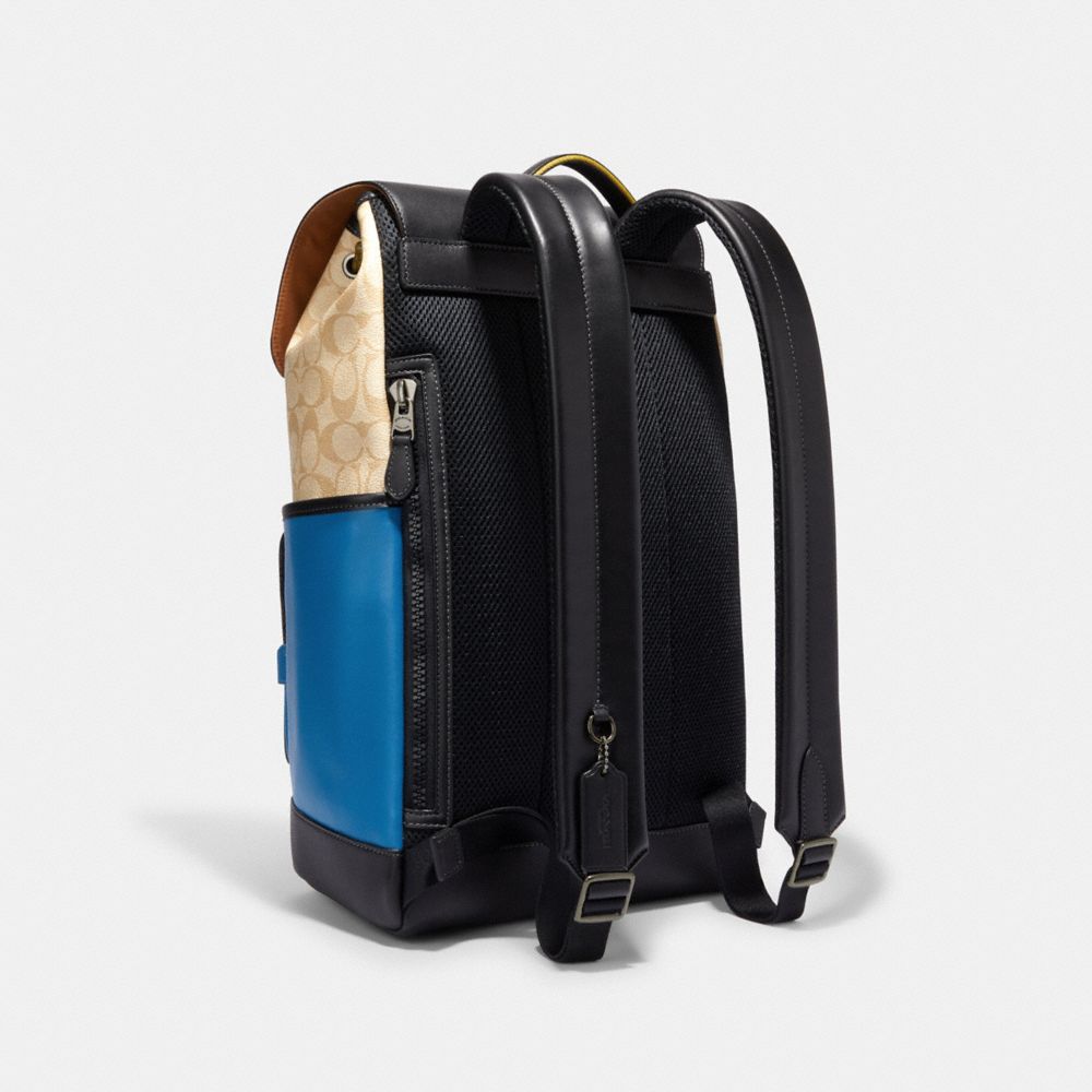 COACH®,TRACK BACKPACK IN COLORBLOCK SIGNATURE CANVAS WITH COACH STAMP,Signature Canvas,X-Large,Black Antique Nickel/Light Khaki/Blue Jay Multi,Angle View