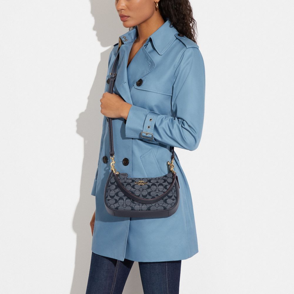 Buy the Coach Denim Mini Crossbody Satchel Blue