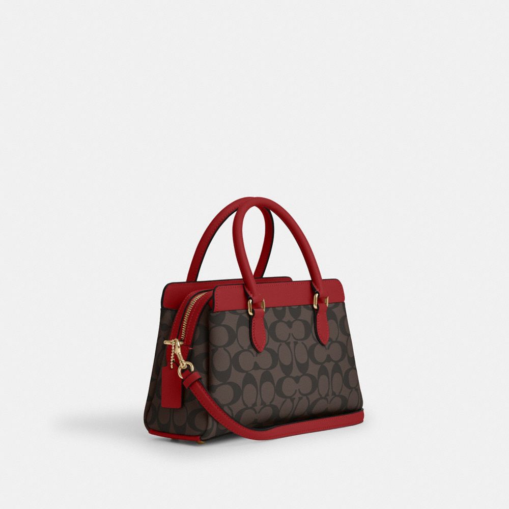 COACH®,MINI DARCIE CARRYALL BAG IN SIGNATURE CANVAS,Signature Canvas,Small,Gold/Brown 1941 Red,Angle View