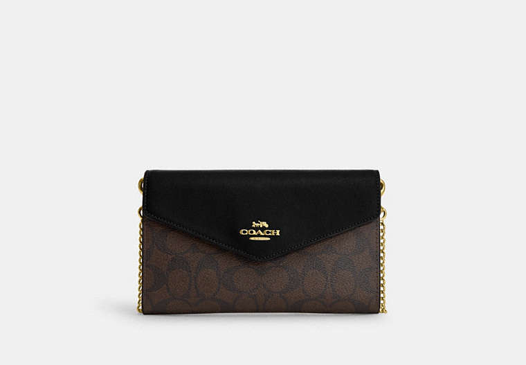 COACH®,ENVELOPE CLUTCH CROSSBODY IN SIGNATURE CANVAS,Mini,Gold/Brown Black,Front View image number 0